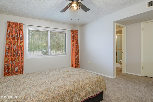 19417 N Palo Verde Dr, Sun City, AZ 85373 - bedroom with carpet floors, baseboards, visible vents, and a textured ceiling