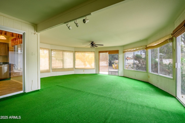19417 N Palo Verde Dr, Sun City, AZ 85373 - unfurnished sunroom with rail lighting and a healthy amount of sunlight