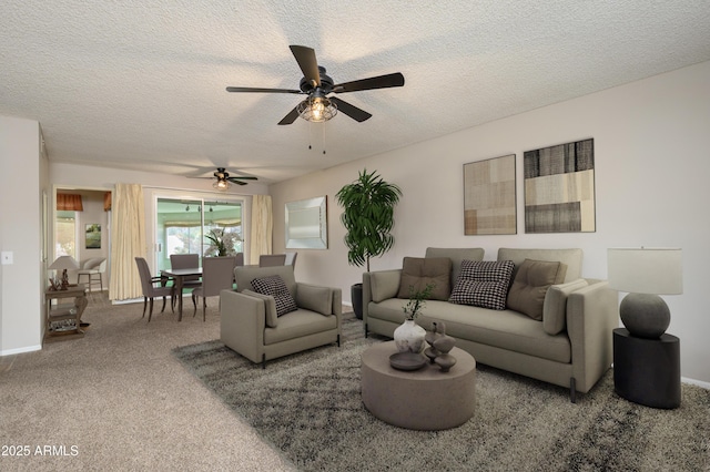 19417 N Palo Verde Dr, Sun City, AZ 85373 - living area featuring carpet floors, a textured ceiling, and a ceiling fan