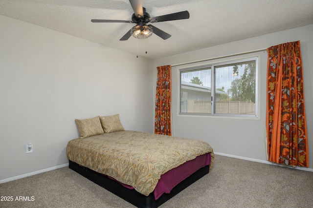 19417 N Palo Verde Dr, Sun City, AZ 85373 - bedroom featuring baseboards, carpet flooring, a textured ceiling, and a ceiling fan