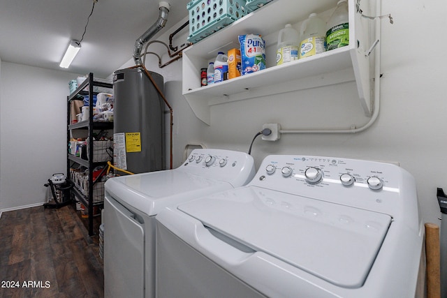 laundry area with washing machine and dryer, hardwood / wood-style floors, and water heater