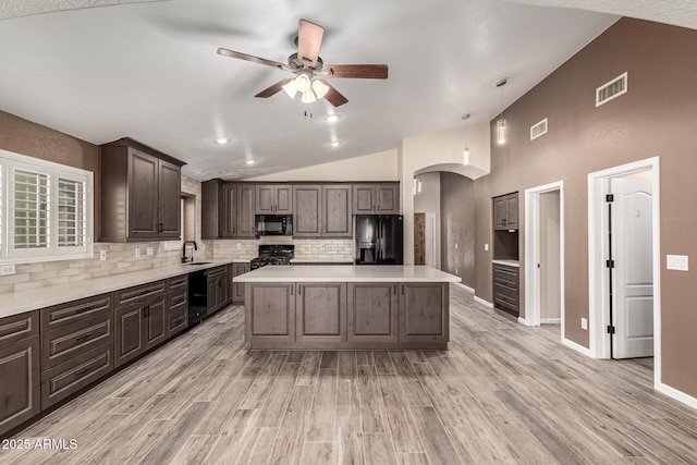 3028 W Parkside Ln, Phoenix, AZ 85027 - kitchen featuring black appliances, a sink, dark brown cabinetry, backsplash, and ceiling fan