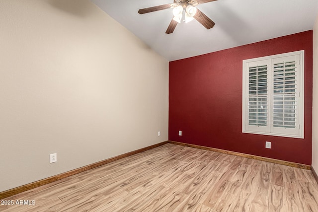 3028 W Parkside Ln, Phoenix, AZ 85027 - unfurnished room featuring a ceiling fan, light wood-type flooring, vaulted ceiling, and baseboards
