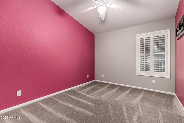 3028 W Parkside Ln, Phoenix, AZ 85027 - carpeted spare room featuring ceiling fan, baseboards, and vaulted ceiling