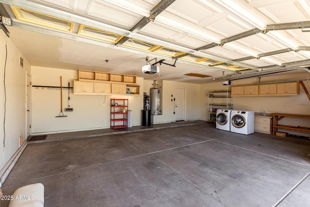 3028 W Parkside Ln, Phoenix, AZ 85027 - garage featuring washing machine and dryer, a garage door opener, and gas water heater