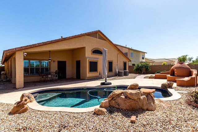 3028 W Parkside Ln, Phoenix, AZ 85027 - rear view of property featuring stucco siding, a patio, a fenced backyard, and central AC unit