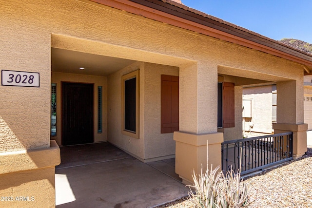 3028 W Parkside Ln, Phoenix, AZ 85027 - doorway to property with stucco siding