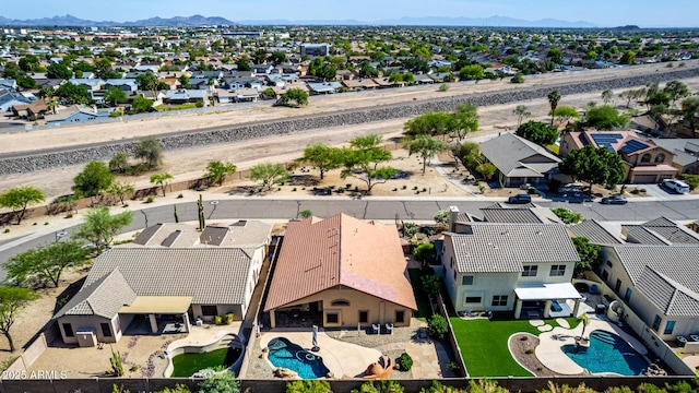 3028 W Parkside Ln, Phoenix, AZ 85027 - aerial perspective of suburban area featuring a pool area and mountains