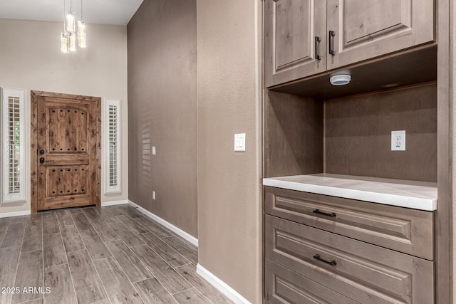 3028 W Parkside Ln, Phoenix, AZ 85027 - entryway featuring baseboards and light wood-type flooring