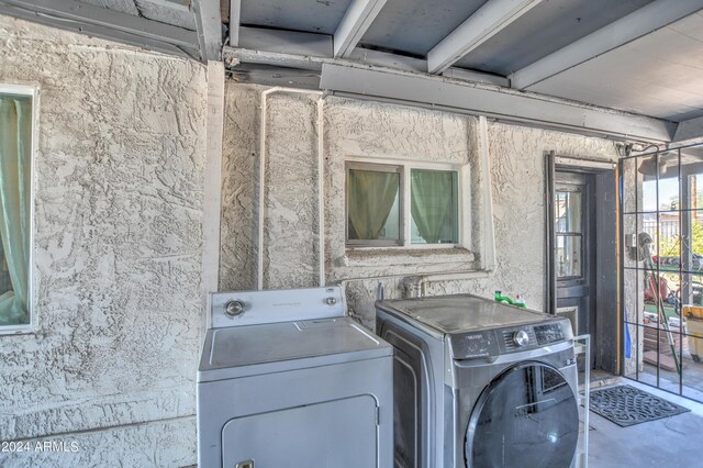 2124 W Maricopa St, Phoenix, AZ 85009 - clothes washing area with independent washer and dryer