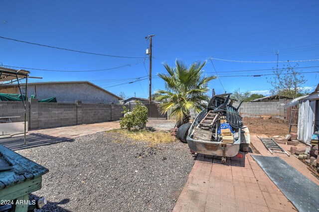 2124 W Maricopa St, Phoenix, AZ 85009 - fenced backyard featuring a patio area