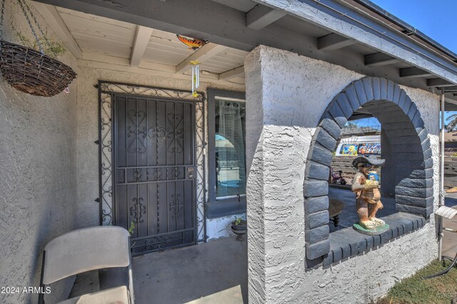 2124 W Maricopa St, Phoenix, AZ 85009 - view of exterior entry featuring stucco siding