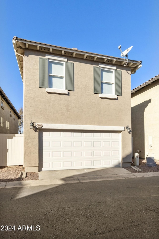 view of front of home featuring a garage