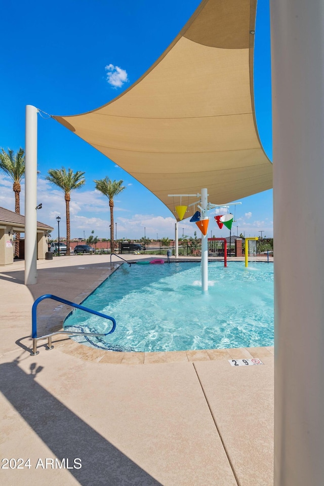 view of pool with a patio area