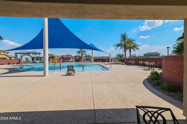 view of pool featuring a patio area