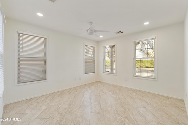 unfurnished room featuring ceiling fan