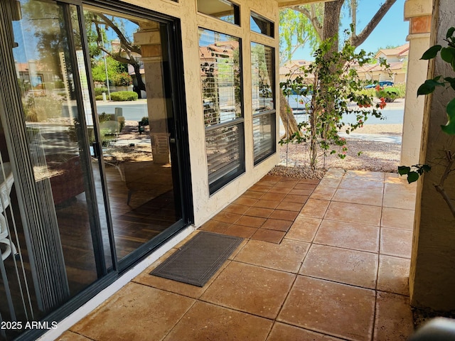9707 E Mountain View Rd Unit 1408, Scottsdale, AZ 85258 - doorway to outside featuring tile patterned flooring
