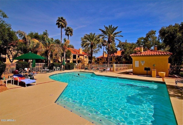 9707 E Mountain View Rd Unit 1408, Scottsdale, AZ 85258 - community pool featuring fence and a patio area