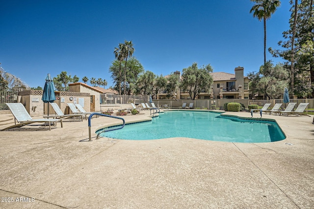 9707 E Mountain View Rd Unit 1408, Scottsdale, AZ 85258 - community pool with a patio and fence