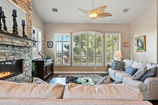 601 E Phoenix St, Payson, AZ 85541 - living area featuring visible vents, wood finished floors, and a fireplace