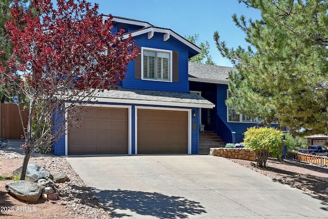 601 E Phoenix St, Payson, AZ 85541 - view of front of property with concrete driveway, fence, roof with shingles, and a garage
