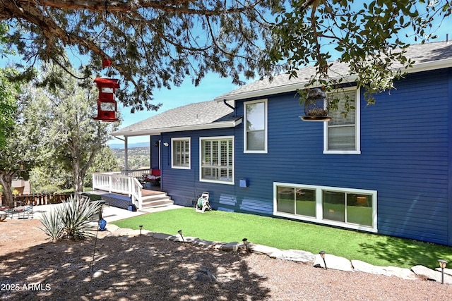 601 E Phoenix St, Payson, AZ 85541 - rear view of property with a yard, a wooden deck, and roof with shingles
