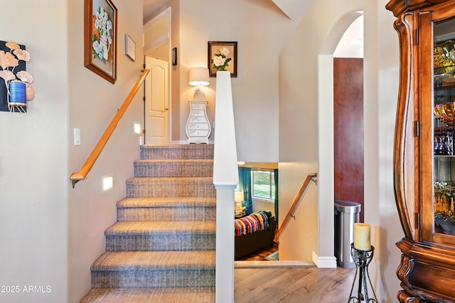 601 E Phoenix St, Payson, AZ 85541 - stairs with arched walkways and wood finished floors