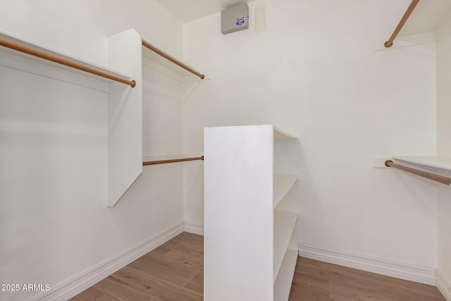 1213 W Beck Ln, Phoenix, AZ 85023 - walk in closet with wood finished floors