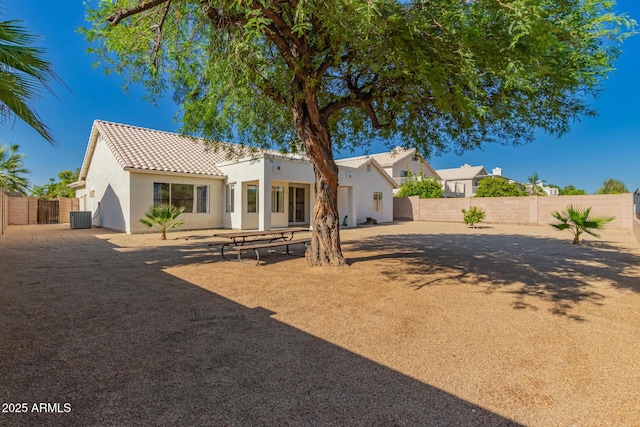 1213 W Beck Ln, Phoenix, AZ 85023 - back of house with stucco siding, a tile roof, and a fenced backyard