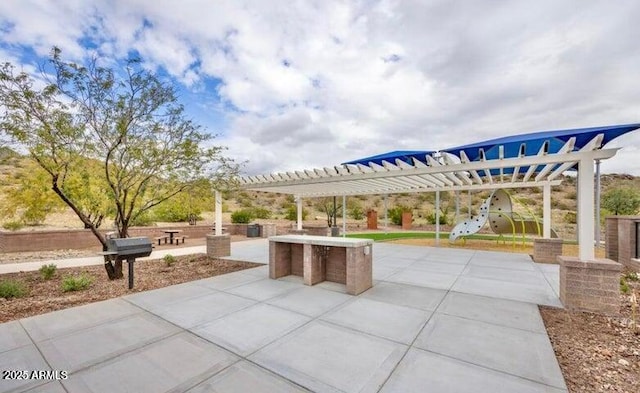 view of patio / terrace featuring a pergola