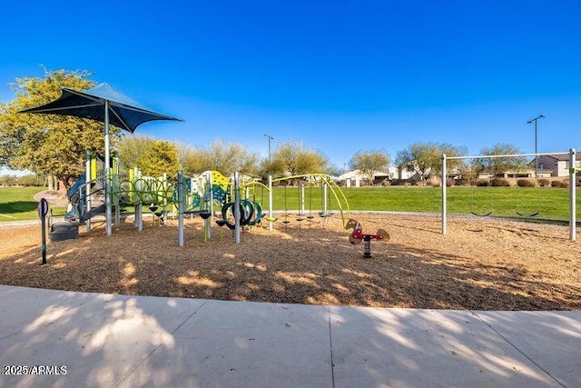 community play area with a lawn