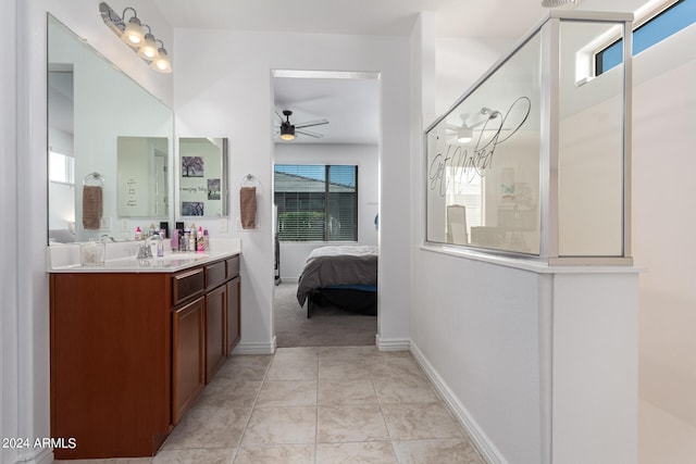 bathroom featuring vanity, tile patterned flooring, plenty of natural light, and ceiling fan