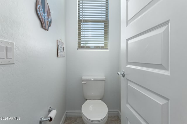 bathroom featuring toilet