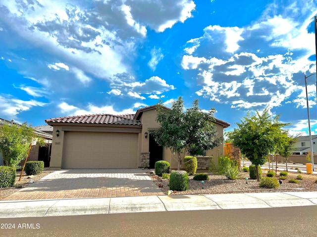 view of front of property featuring a garage