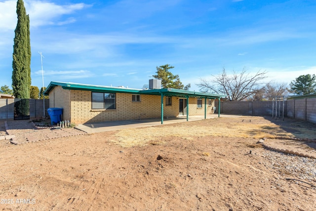 back of property with a patio area