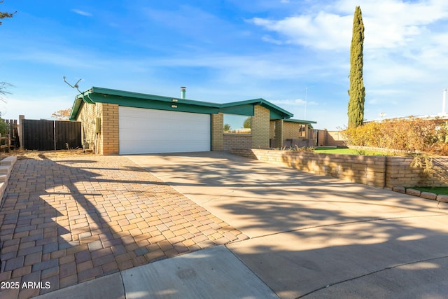 single story home with a garage