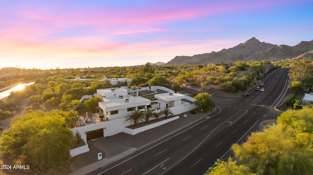 aerial view at dusk with a mountain view