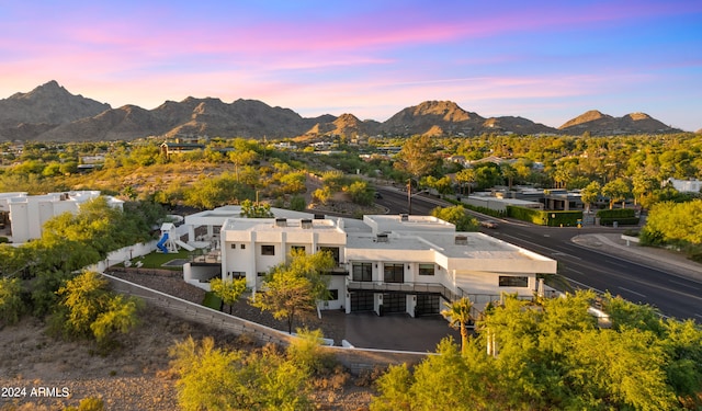 aerial view at dusk with a mountain view