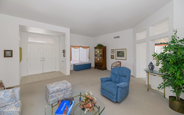 living room with light colored carpet