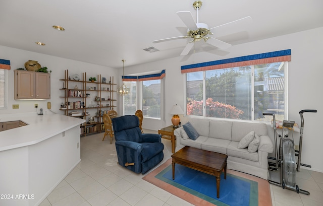 tiled living room with ceiling fan