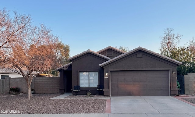 view of front of home with a garage