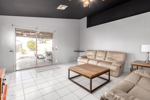 living room with light tile patterned floors and ceiling fan