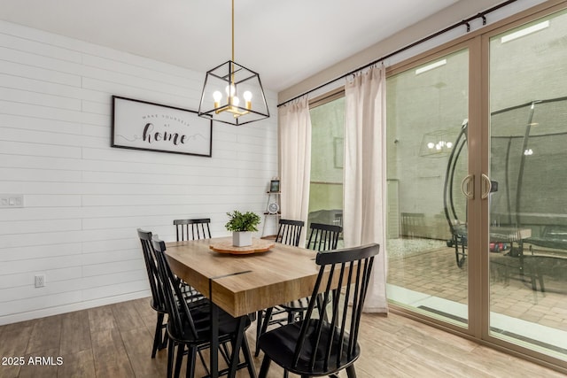 13380 N 148th Ave, Surprise, AZ 85379 - dining room featuring wood finished floors and a chandelier