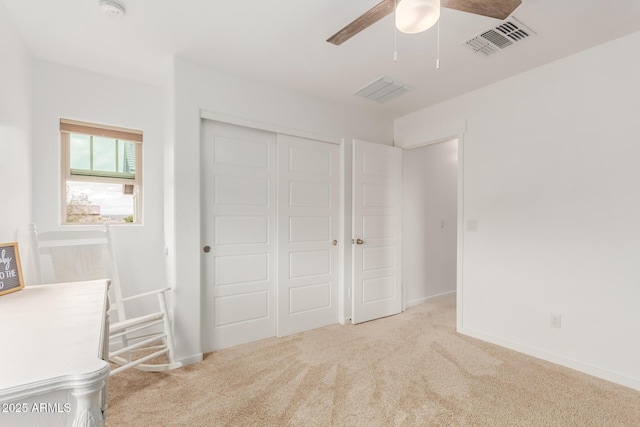 13380 N 148th Ave, Surprise, AZ 85379 - unfurnished bedroom with a closet, carpet flooring, a ceiling fan, and baseboards