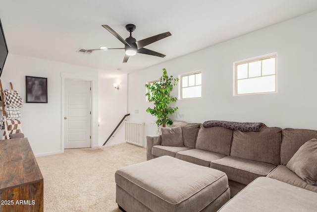 13380 N 148th Ave, Surprise, AZ 85379 - living area with a ceiling fan, light colored carpet, and radiator