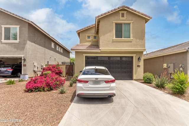 13380 N 148th Ave, Surprise, AZ 85379 - view of front of house featuring a garage, stucco siding, concrete driveway, a tiled roof, and fence