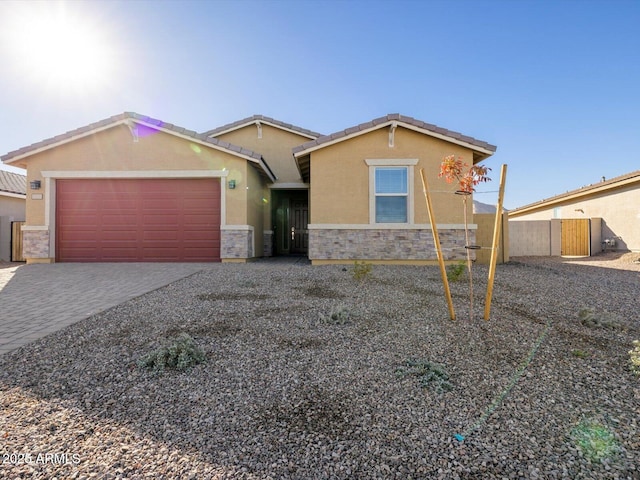 single story home with a garage