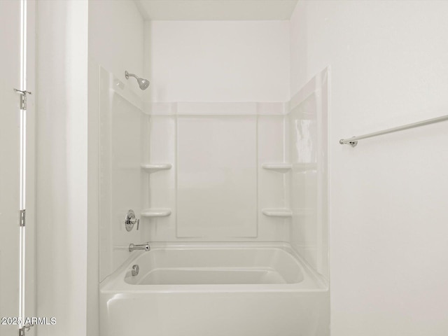 bathroom with shower / tub combination