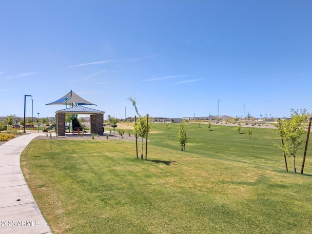 surrounding community with a yard and a gazebo