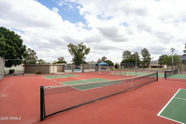 view of sport court with fence and community basketball court